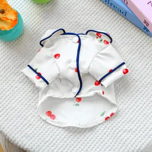 Cute cherry print pet pajamas for dogs and cats, smooth silk-like fabric with blue piping.