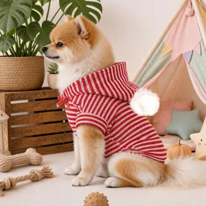 Cute red white striped pet hoodie for small dogs, featuring a cozy pom-pom hood and soft fabric.