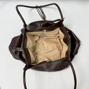 Brown oil wax leather tote bag, large capacity casual shoulder bag for daily commuting.