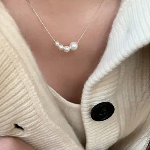 Collier ras de cou en argent sterling perles graduées détail élégance et charme.