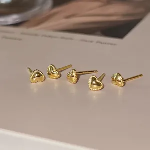 Boucles d'oreilles cœur lisses en argent S925, style bijou minimaliste et doux.