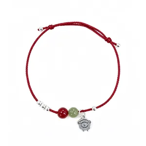 Bracelet cordon rouge mouton dessin animé argent sterling S925 perles jade et cinabre.