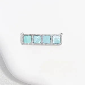 Close up detail of silver copper cubic zirconia square pendant jewelry DIY part.