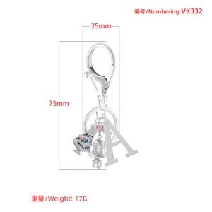 Sweet Christmas letter keychain with multi-color stones, metal ring, 75mm size, elegant gift.