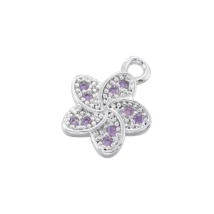 Detailed macro shot of a copper purple crystal five-petal flower pendant charm for DIY jewelry.