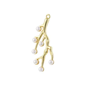Gold tone branch pendant with white pearls detail shot jewelry accessory component charm