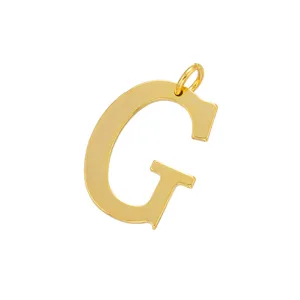 Gold letter G pendant detail shot, minimalist jewelry accessory for keychains and crafts.