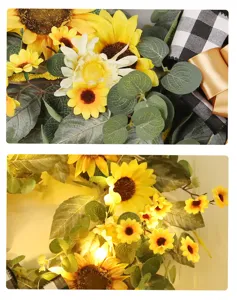 Couronne de tournesol artificielle avec noeud et lumieres pour la decoration murale.