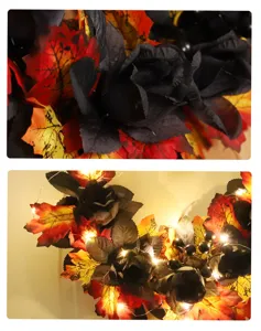 Primo piano dettagliato della ghirlanda di rose nere di Halloween con foglie e bacche.