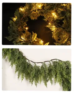 Détail de guirlande de cèdre artificielle, branche de feuillage vert pour noël.