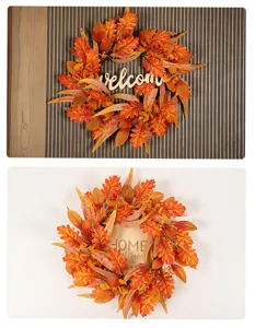 Autumn maple leaf wreath detail, artificial foliage with welcome sign for front door decoration.