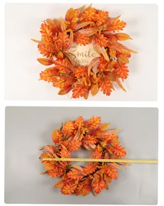 Autumn maple leaf wreath detail view with wooden sign and tape measure for indoor outdoor decor.