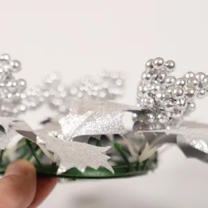Christmas artificial silver berry and maple leaf candle ring for table decoration.