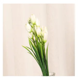 Artificial tulip flower bouquet with white buds and green leaves for home and room decor.