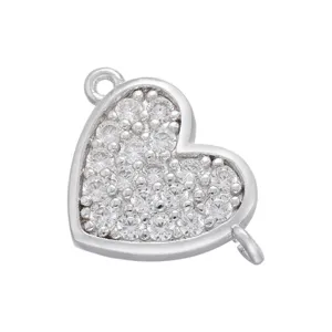 Detailed close-up of heart-shaped double-loop cubic zirconia connector jewelry component.
