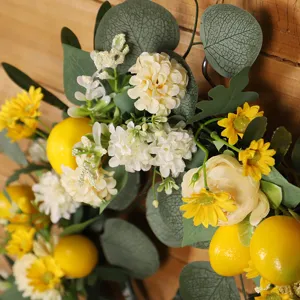 Couronne de fleurs de citron artificielles avec feuilles d'eucalyptus pour déco.