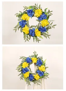 Artificial hydrangea wreath with blue yellow flowers and green eucalyptus leaves for spring home decor