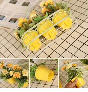 Artificial flower wall hanging basket with iron frame and yellow plastic pots for home decor.