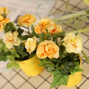 Artificial yellow rose potted plants for home decor table centerpiece floral arrangement.
