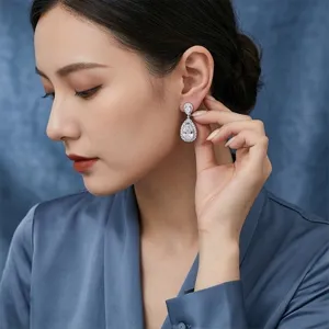 Squisiti orecchini pendenti in zircone a forma di goccia con pietre brillanti da donna.