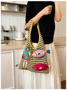 Cozy knit shoulder bag with cute fish embroidery, stylish casual tote for women daily use.