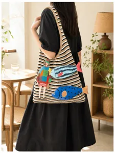 Cozy striped crochet shoulder bag featuring cute 3D fish and girl appliques tote