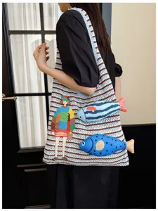 Knitted shoulder tote bag with cute fish and figure embroidery, casual leisure style for women.
