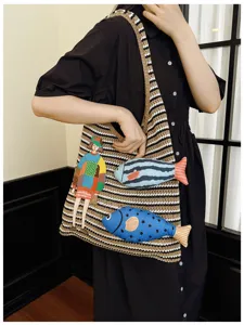 Knit striped shoulder bag with cute cartoon girl embroidery and 3D fish details for daily.