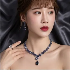 Sapphire zircon teardrop necklace earrings set luxury bridal evening dress jewelry details.