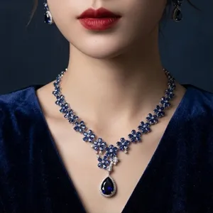 Exquisite sapphire zirconia teardrop necklace and earrings set for bridal luxury evening wear.