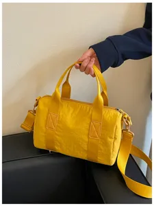 Stylish women's yellow canvas handbag versatile casual crossbody shoulder bag for daily commute.