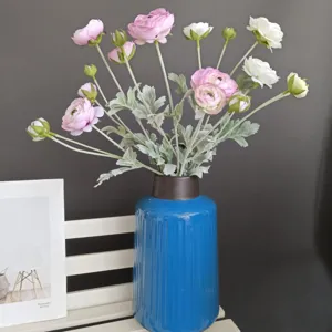 Artificial ranunculus flowers bouquet in blue ceramic vase home decor photography prop