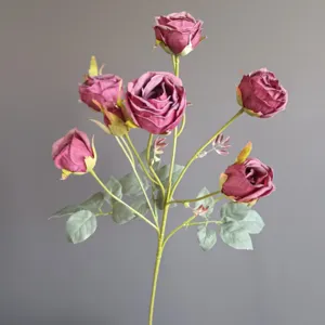 Detailed view of artificial rose flower branch, 10-head faux fabric roses for home decor.