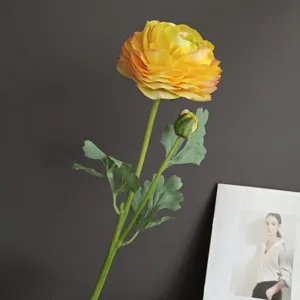 Artificial silk ranunculus flower detail shot, premium touch yellow floral decor for home.
