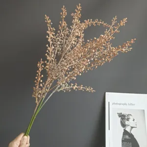 Detail view of artificial berry branch decor, ideal for Nordic home floral arrangement.