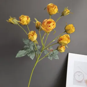 Artificial yellow 10-head rose flower branch for home decor wedding party DIY floral arrangements.