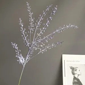 Detail shot of artificial light purple berry fruit branch for Nordic home decor floral design.