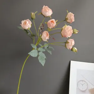 Artificial 10-head pink rose flower branch crepe cloth for home wedding decor design.