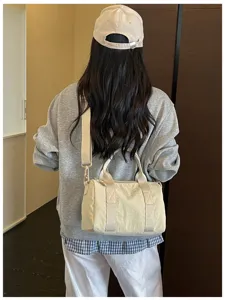 Versatile casual daily shoulder bag, lightweight solid color crossbody bag for women commute.
