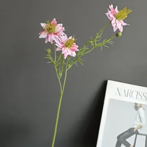 Artificial flower detail view, pink daisy branch photography prop, home decor floral arrangement display.