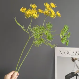 Artificial fennel flower lace flower detail shot, realistic green and yellow plant decor for home.