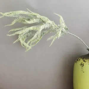 Artificial flocked Boston fern single leaf stem for home decor floral arrangement detail.