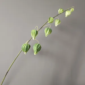 Branche de physalis artificielle en PU pour decoration interieure d'hotel gros plan