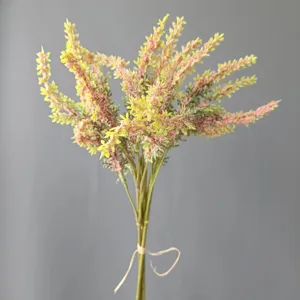 Detailed close-up shot of artificial frosted lavender bouquet, showing textured petals and stems.