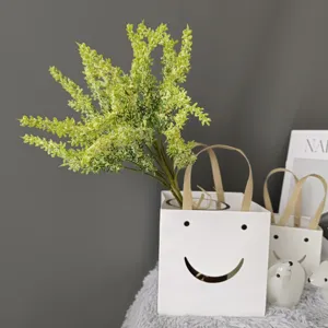 Artificial green faux foxtail grass lavender plant in white smiley paper bag pot home decor detail