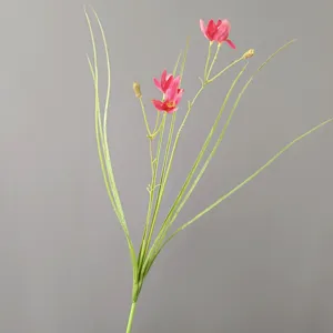 Artificial pink flower stem detail with green leaves for home decoration and floral arrangements.