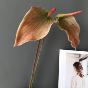 Artificial anthurium flower detail view, realistic touch simulation plant for home decor.