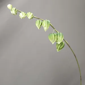 Détail de branche de lanterne chinoise en PU artificiel, idéal pour déco d'hôtel moderne.