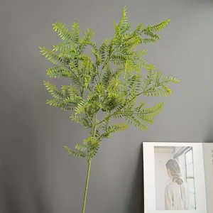 Artificial fern branch greenery spray faux foliage plant stem for home decor floral arrangement.