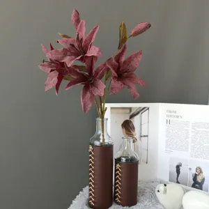 Artificial oil painting style silk lily flowers with leather wrapped glass vases for home decor.